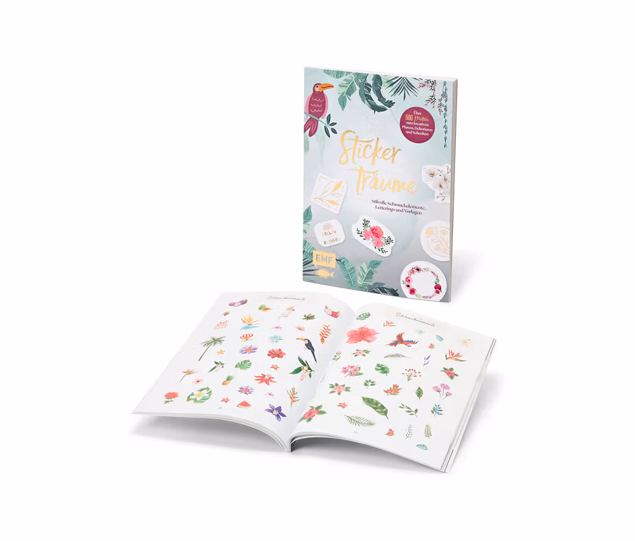 Zwei offene Bücher »Stickerträume« mit Aufklebern.