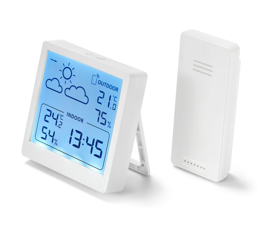Zwei weiße Wetterstationen zeigen Temperatur und Luftfeuchtigkeit an.