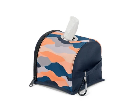 Toilettenpapier-Spender mit orange-blauem Muster.