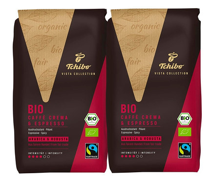 Zwei Packungen Tchibo Vista Collection Bio Caffè Crema & Espresso nebeneinander.