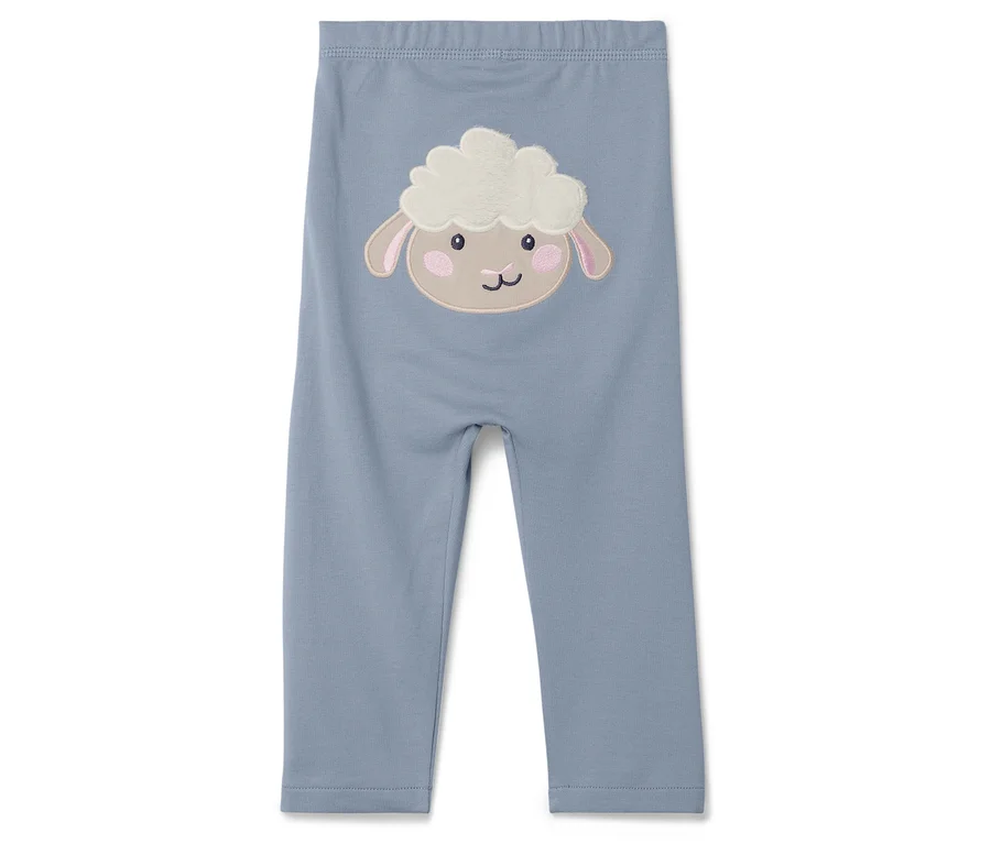 Blaue Leggings mit Schaf-Applikation.