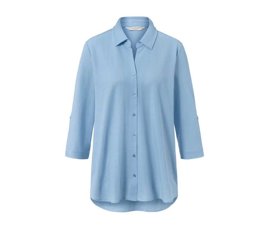 Hellblaue Piqué-Jerseybluse mit Dreiviertelärmeln.