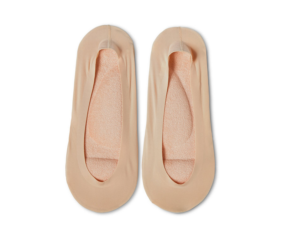 Zwei Paar hautfarbene Füßlinge mit Fußbett.