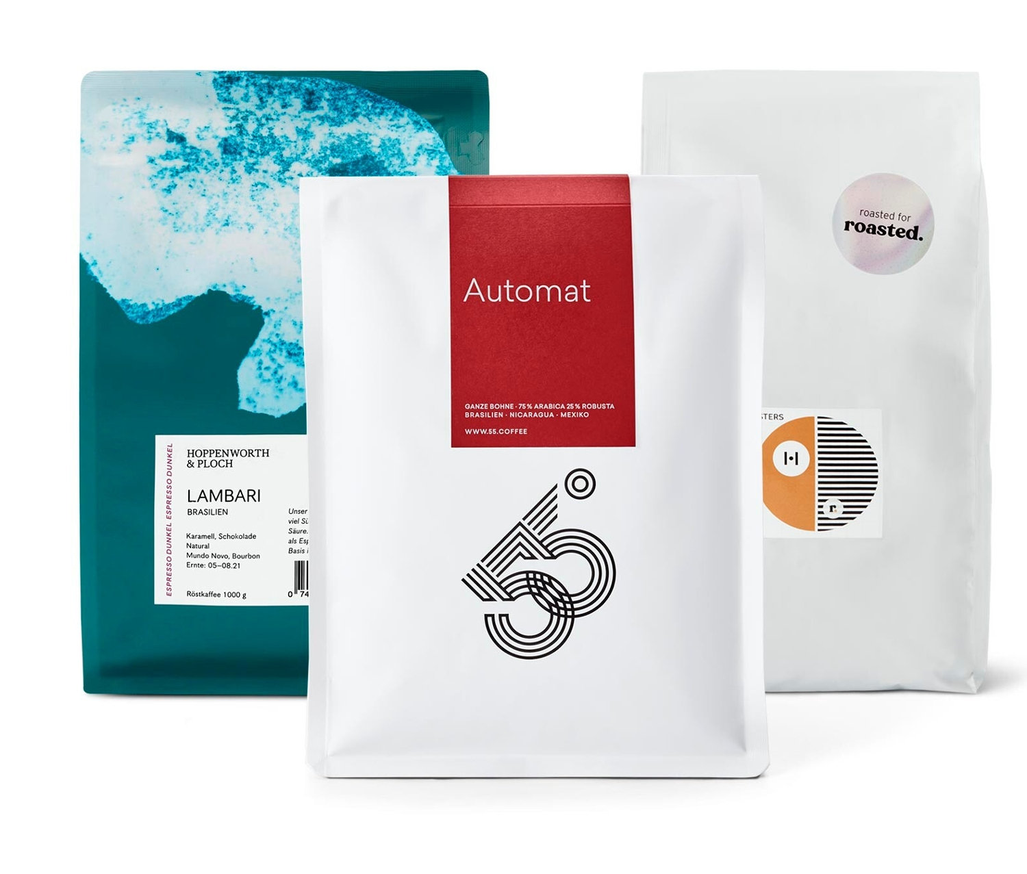 Drei Kaffeepackungen, darunter eine Packung Espresso Probierset "Rundreise durch Südamerika" - 3x 1 kg Ganze Bohne.