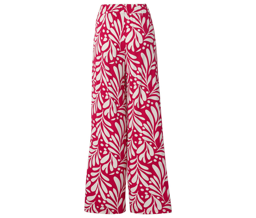 Eine lange, rote Hose mit weißem Blattmuster liegt auf einer ebenen Fläche.