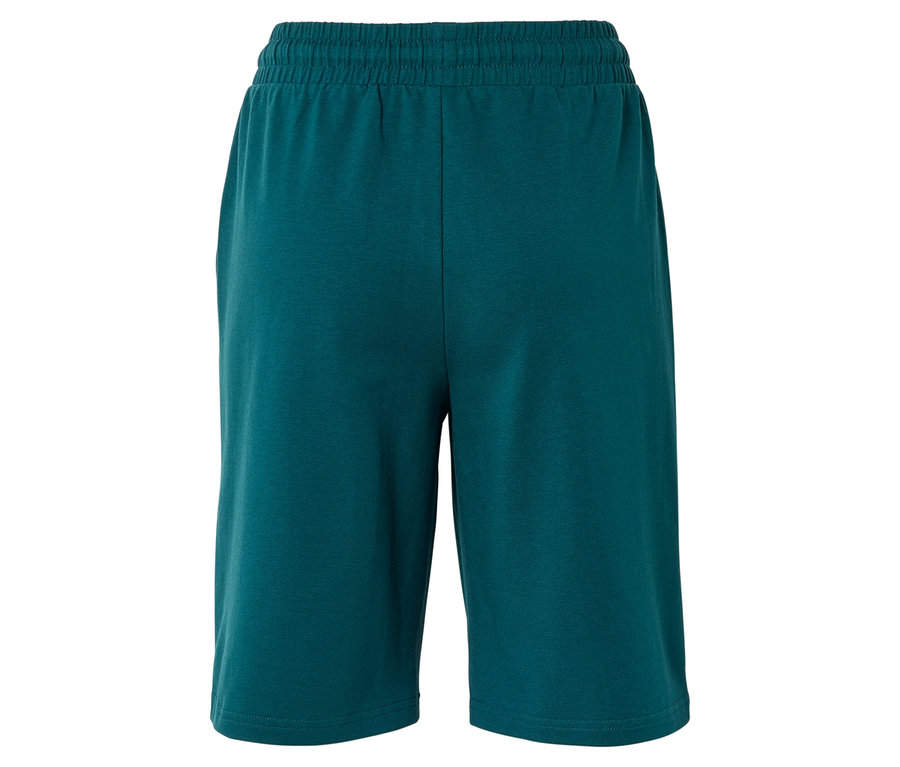 Nahaufnahme von türkisfarbenen Shorts mit Gummibund, von hinten fotografiert.