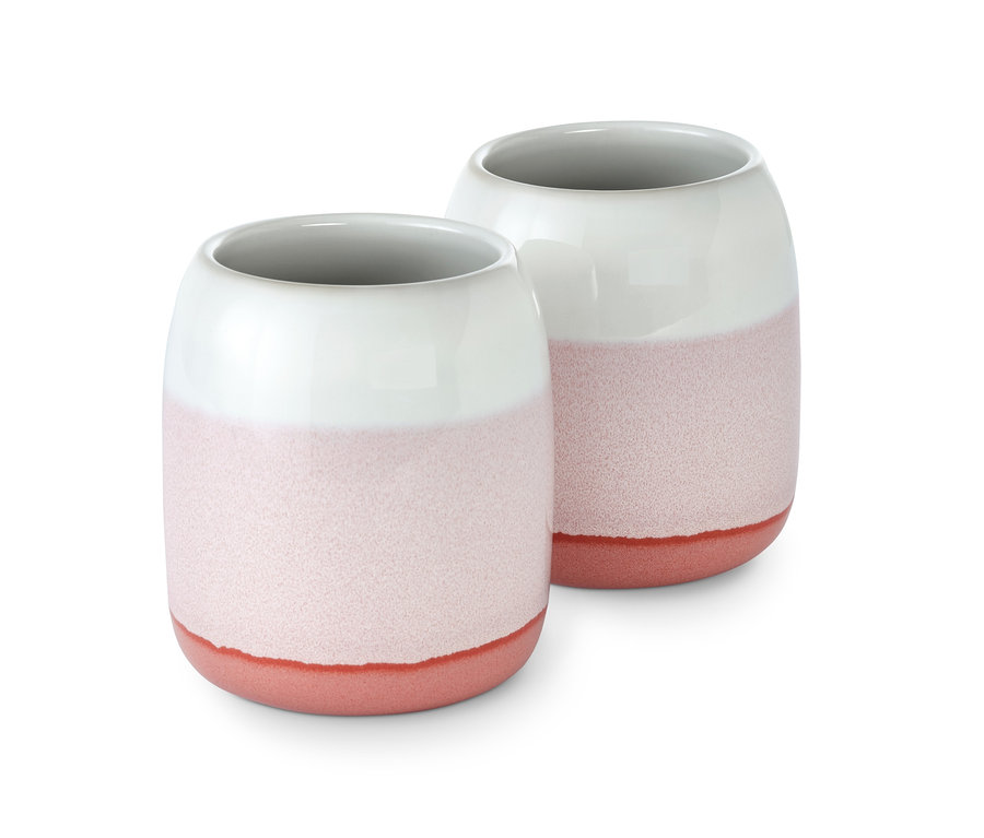 Zwei Zahnputzbecher mit weißem Oberteil und rosa Unterteil.