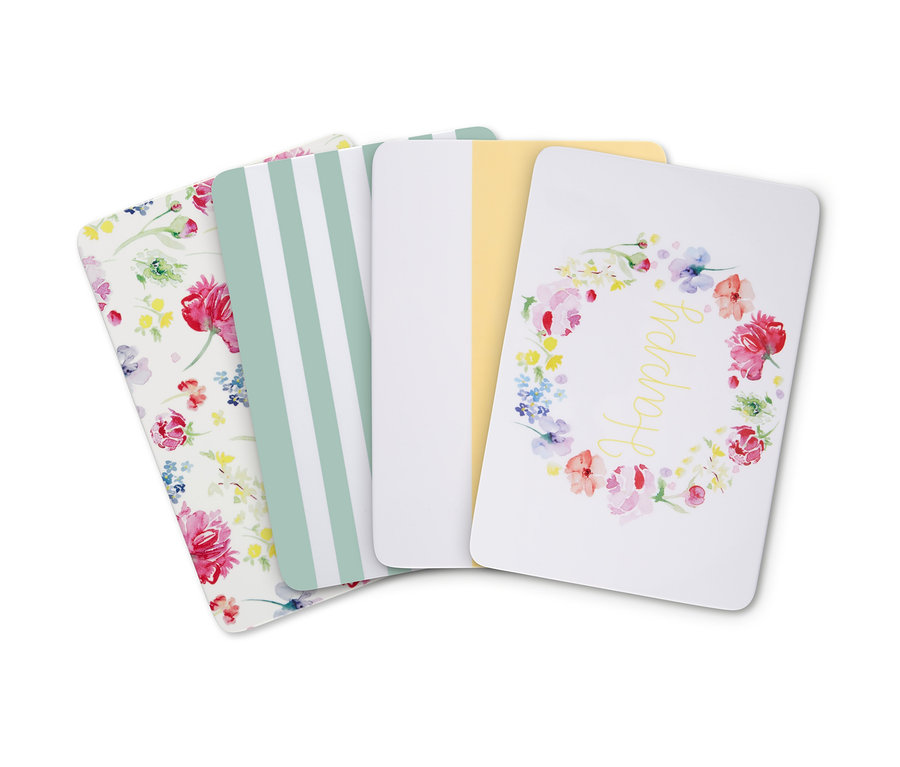 Vier Schneidebretter mit verschiedenen Mustern.