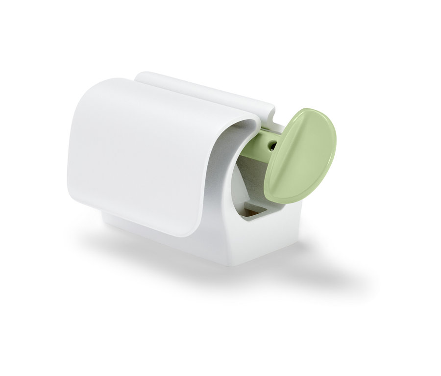 Weißer Tubenpresser mit Kühlschrankclip.