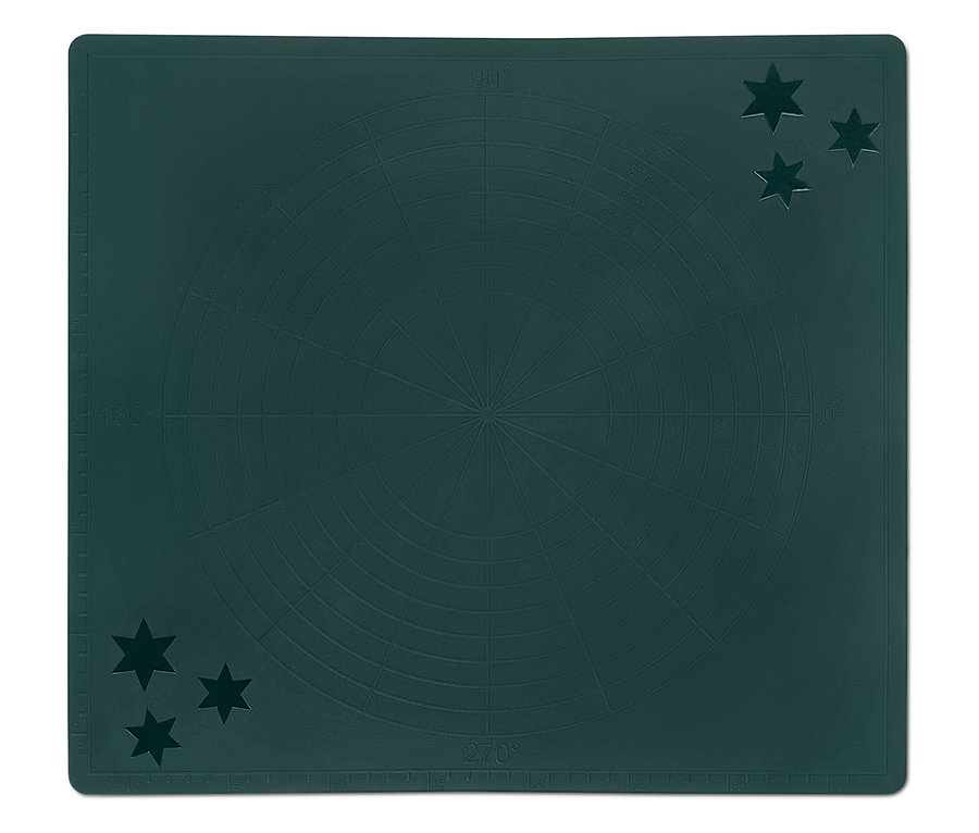 Grüne Schneidematte mit Gradeinteilung und Sternen in den Ecken.
