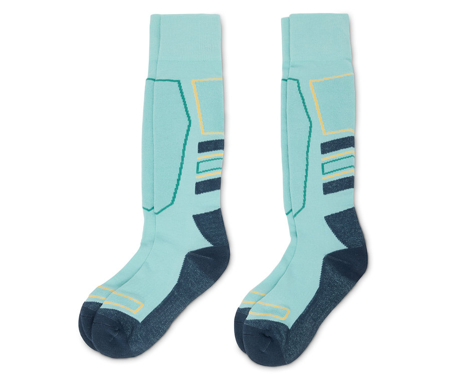 Ein Paar hellblaue Skisocken mit dunkelblauen Fersen und Zehen.