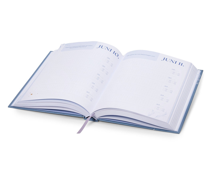 Geöffneter blauer Terminkalender mit den Daten 10. und 11. Juni.