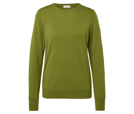 Ein grüner Strickpullover mit langen Ärmeln.