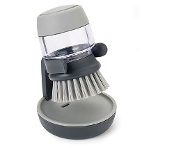 Graue Joseph Joseph Spülbürste mit Spülmittelspender.