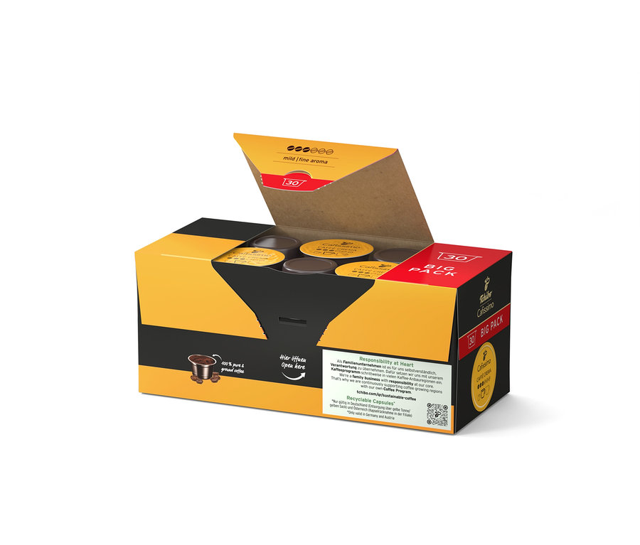 Geöffnete gelb-schwarze Packung Cafissimo Caffè Crema mild 30 Kapseln und eine große Packung Cafissimo Caffè Crema mild - 120 Kapseln.
