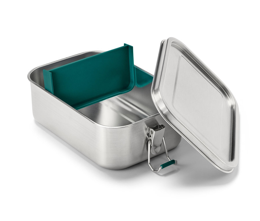 Geöffnete To-go-Lunchbox aus Edelstahl mit grünem Inneneinteiler.