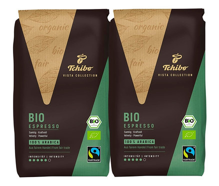Zwei Packungen BIO Espresso Tchibo VISTA COLLECTION. Die Packungen sind braun und grün.