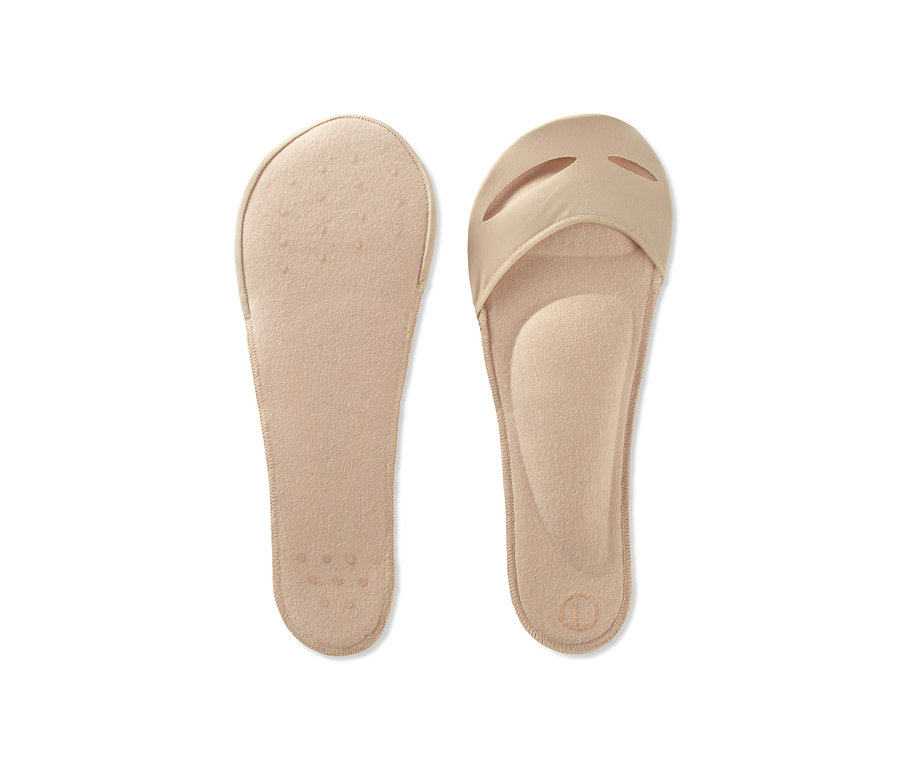 Zwei Paar beigefarbene Einlegesohlen mit Fußbett.