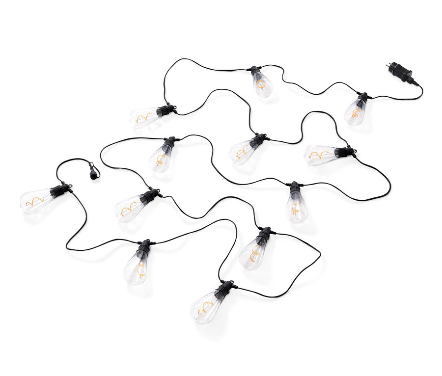 Eine LED-Filament-Lichterkette mit schwarzen Kabeln liegt auf einem weißen Hintergrund.
