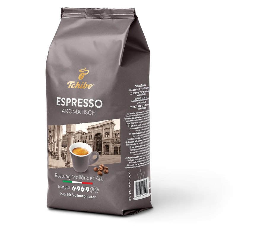 Eine 1 kg Packung Tchibo Espresso Aromatisch Ganze Bohne. Auf der Packung ist eine Tasse Kaffee abgebildet.