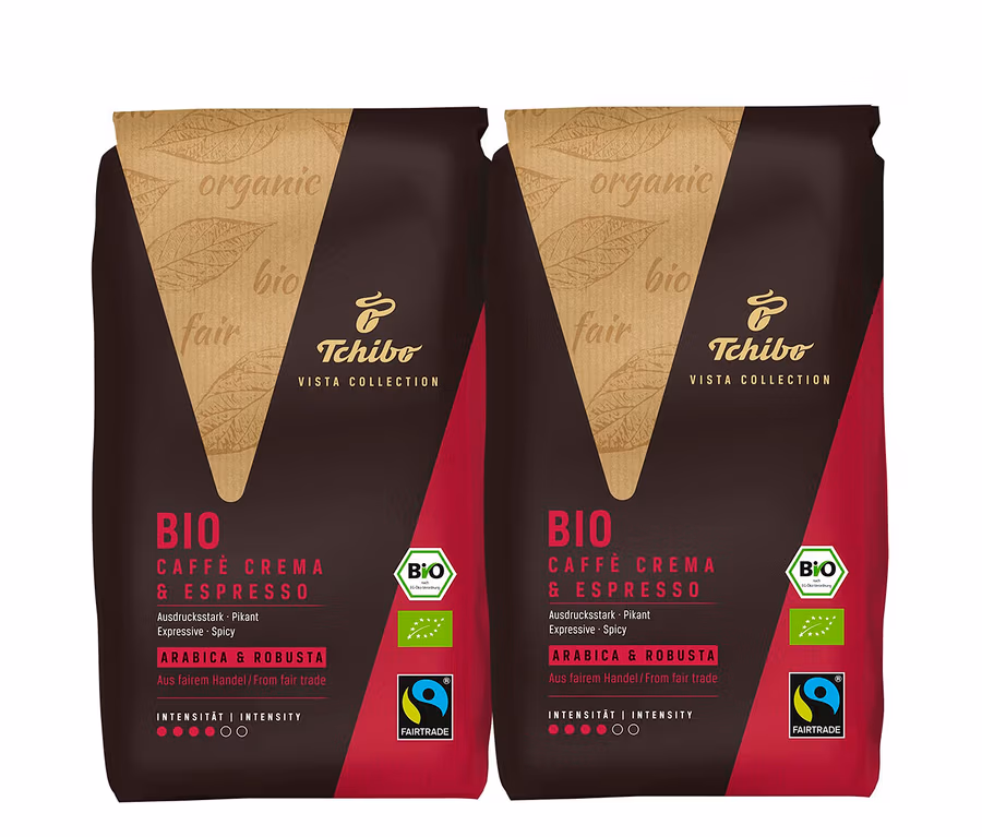 Zwei Packungen Tchibo Vista Collection Bio Caffè Crema & Espresso nebeneinander.