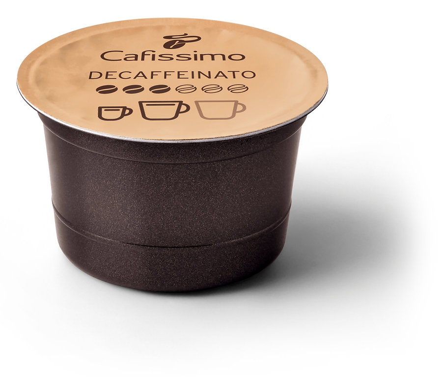 Nahaufnahme einer braunen Cafissimo Decaffeinato Kapsel mit beigem Deckel auf weißem Hintergrund.