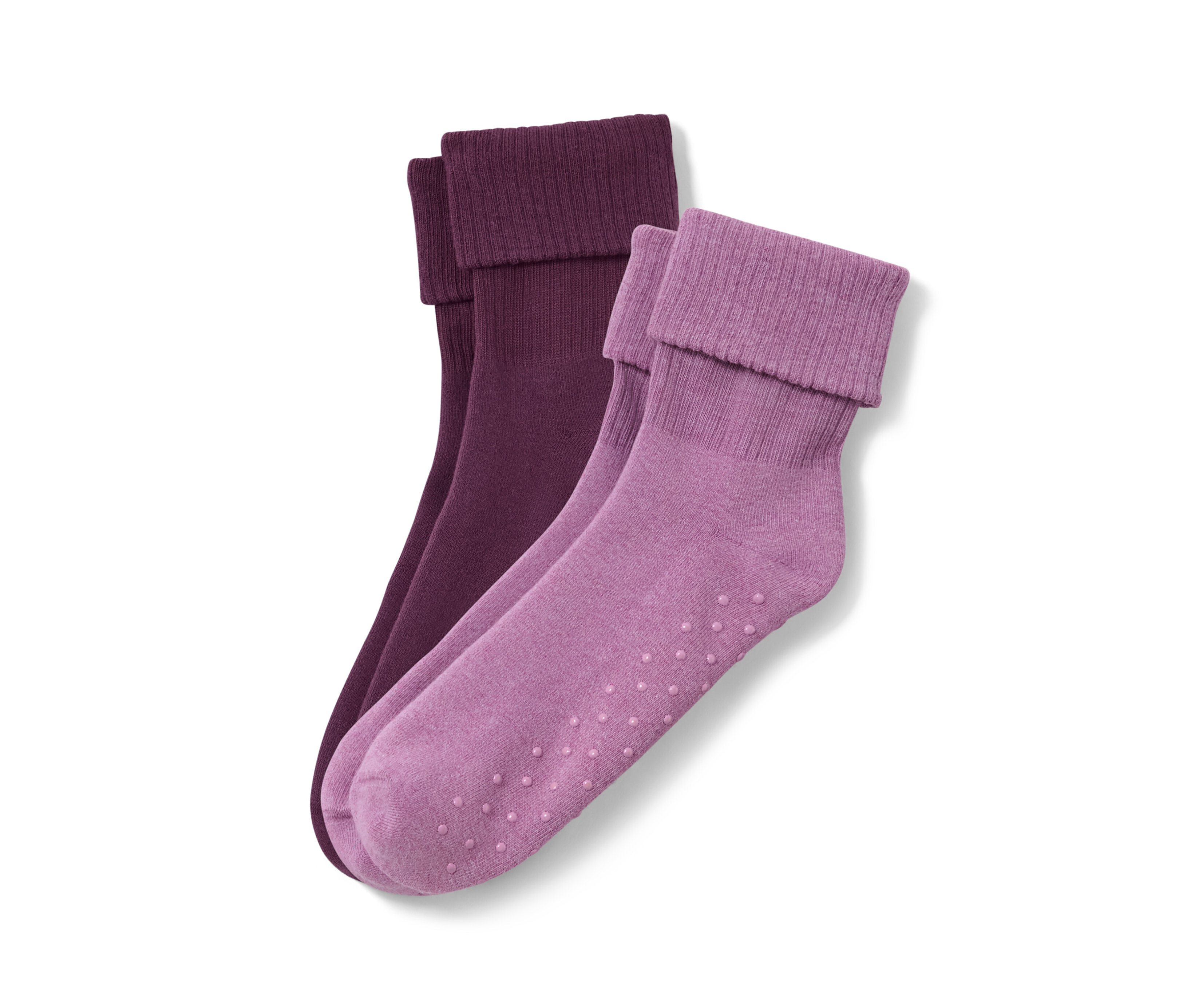 Zwei Paar Stoppersocken: ein Paar lila und ein Paar Lavendel.