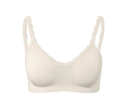Detailansicht eines creme Seamless-Soft-BHs.