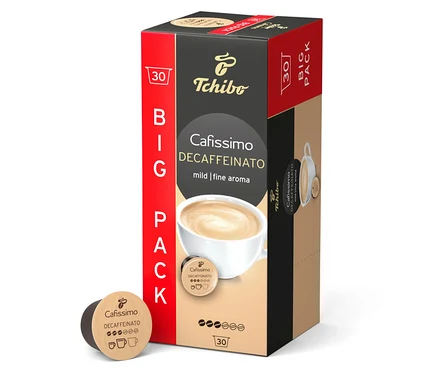 Eine Packung Cafissimo Decaffeinato - entkoffeiniert - 30 Kapseln von Tchibo steht aufrecht. Eine Kapsel liegt daneben.