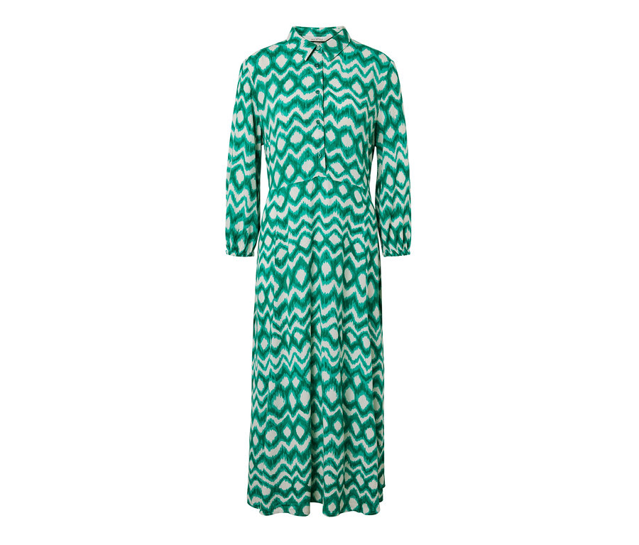 Ein grün-weißes, bedrucktes Hemdblusenkleid.