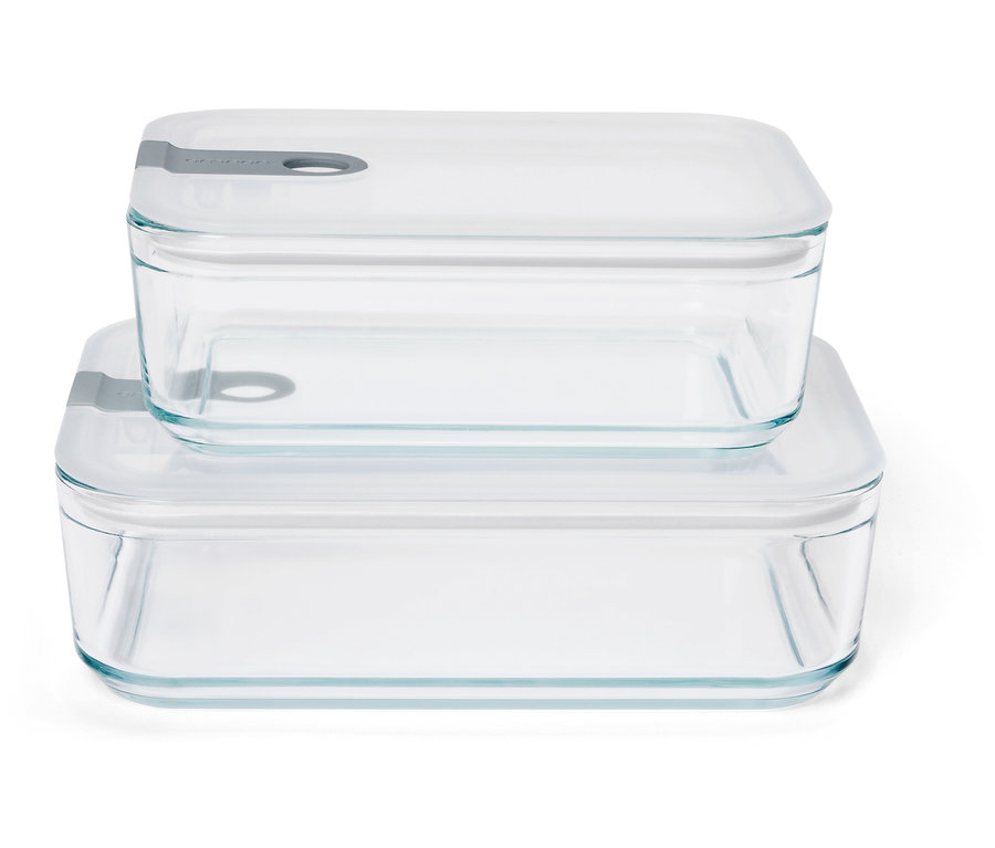 Zwei übereinander gestapelte Glasbehälter mit weißen Deckeln.