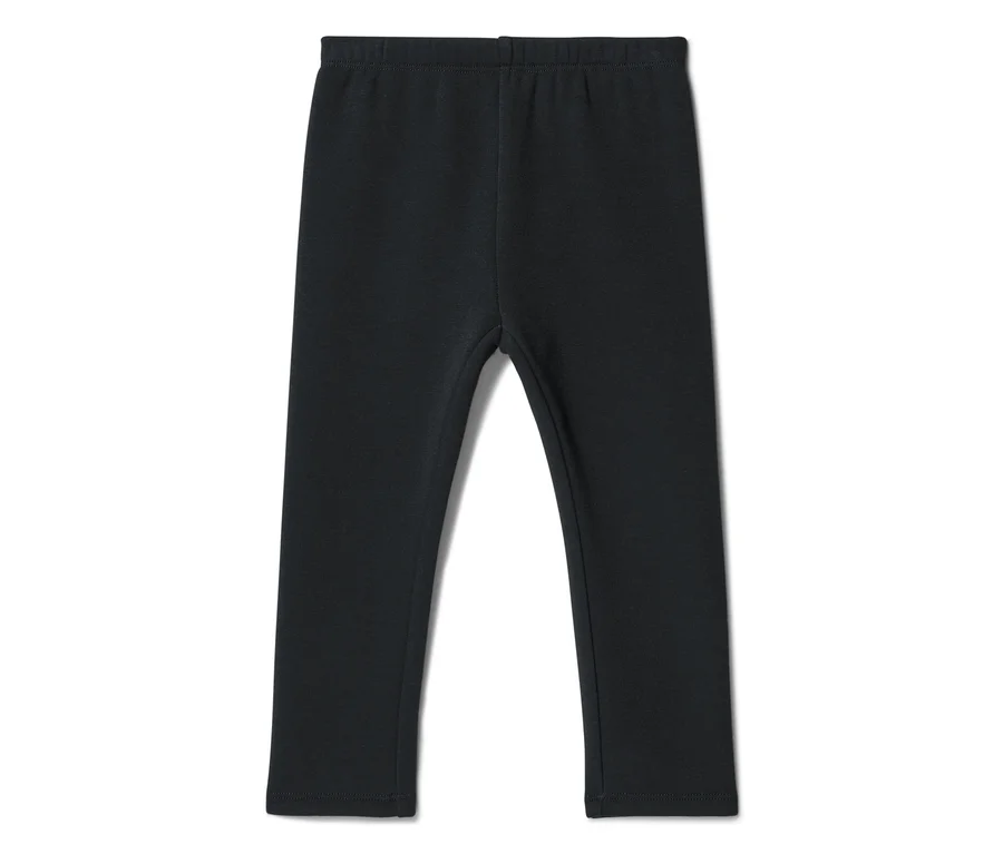 Schwarze Leggings mit elastischem Bund, flach liegend.
