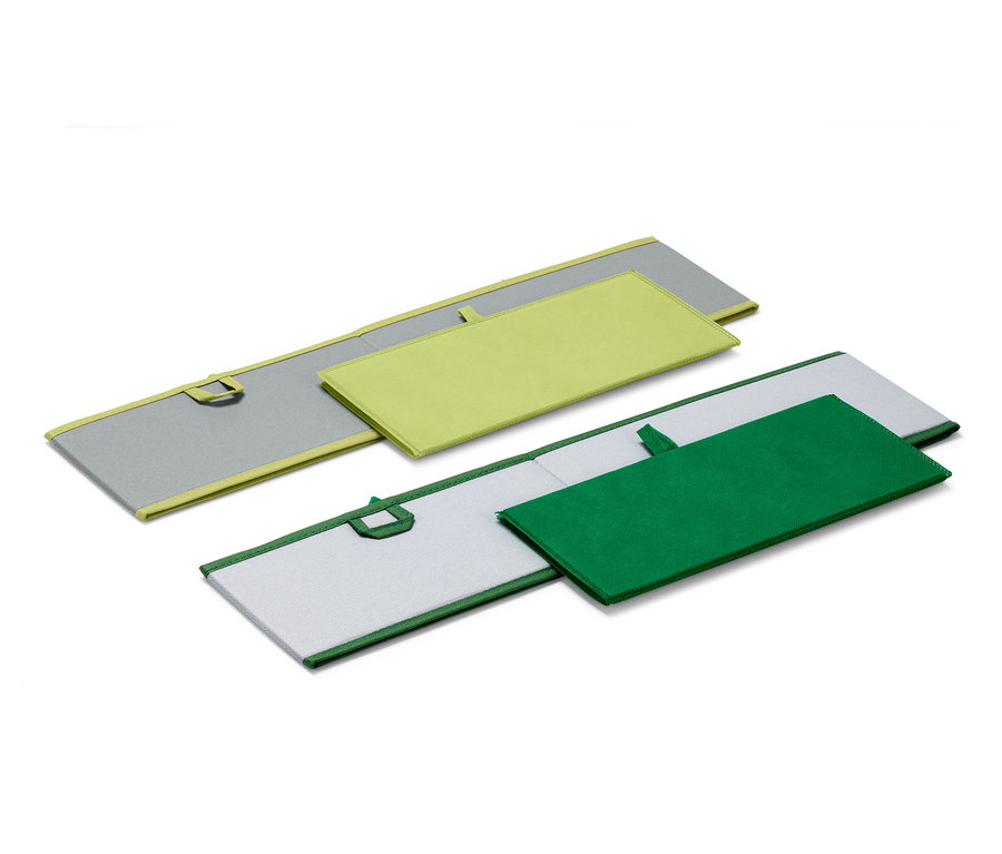 Zwei große Schubladen-Ordnungsboxen, eine hellgrün und eine dunkelgrün.