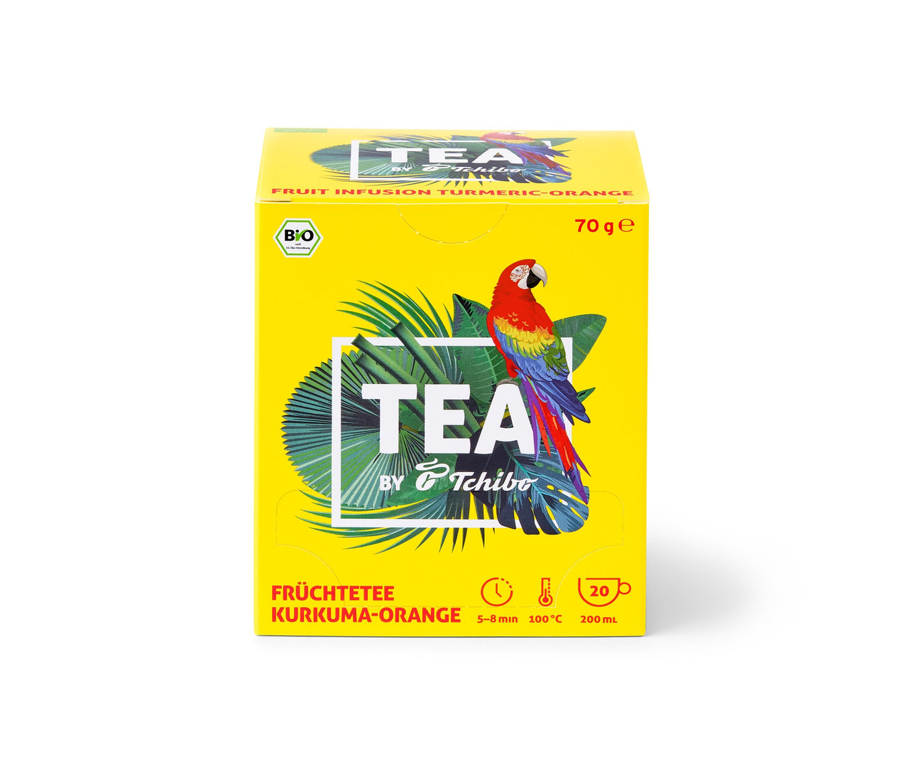 Gelbe Packung TEA by Tchibo Bio Früchtetee Kurkuma-Orange mit einer Abbildung von einem Papagei und tropischen Blättern.