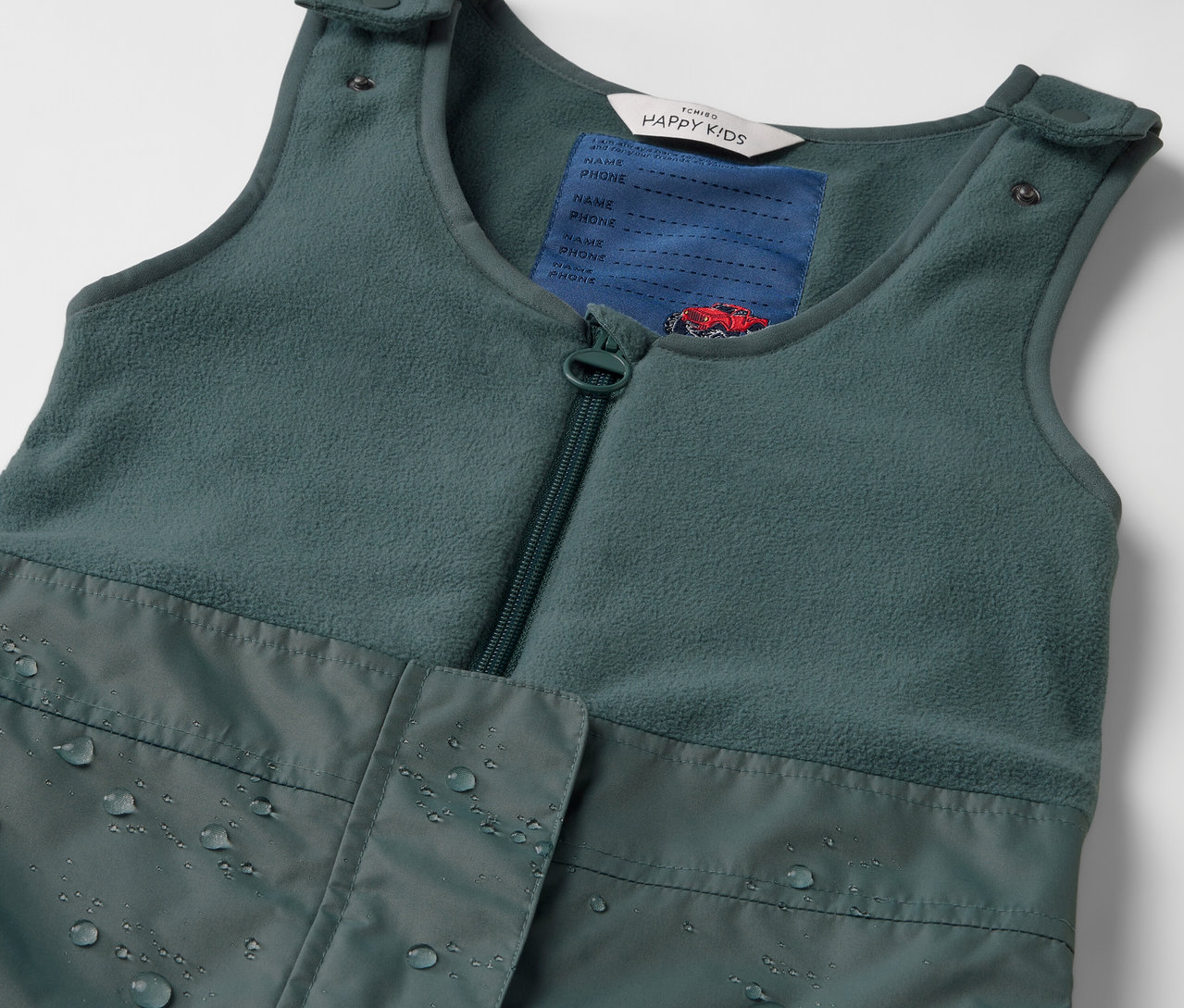 Detailaufnahme einer grünen Kinder-Thermo-Regenhose.