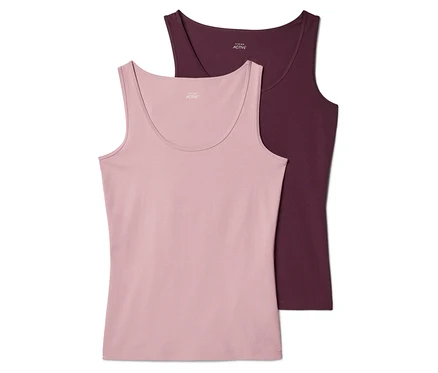 Zwei Tanktops, eins rosa und eins weinrot, liegen übereinander. Beide haben einen runden Ausschnitt und sind ärmellos.