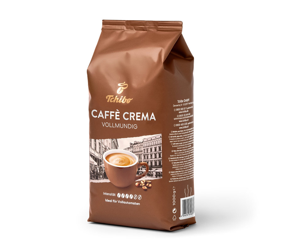 Braune Packung Tchibo Caffè Crema Vollmundig ganze Bohne (1 kg) mit Bild einer Kaffeetasse und Kaffeebohnen.