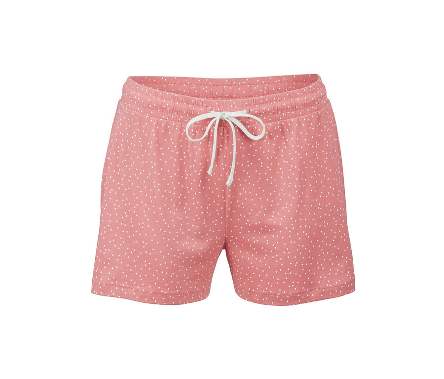 Rosa Shorts mit weißen Punkten.