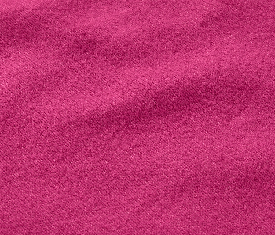 Nahaufnahme einer Stofftextur in Fuchsienrosa.