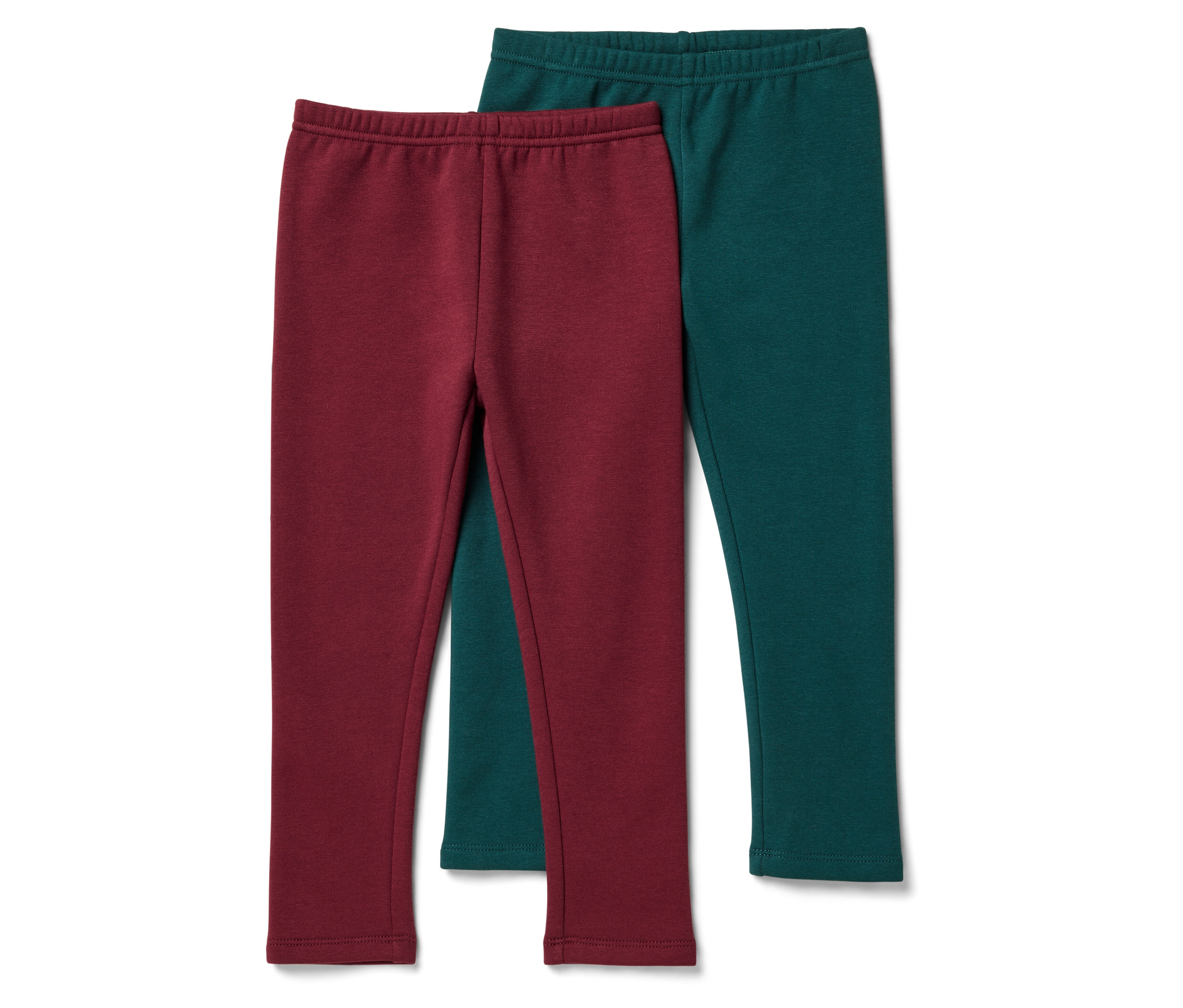 Zwei Leggings, eine bordeauxrot, die andere grün.