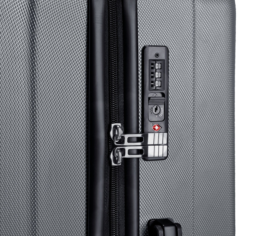 Detailaufnahme eines grauen Hartschalen Koffer-Sets mit Zahlenschloss.