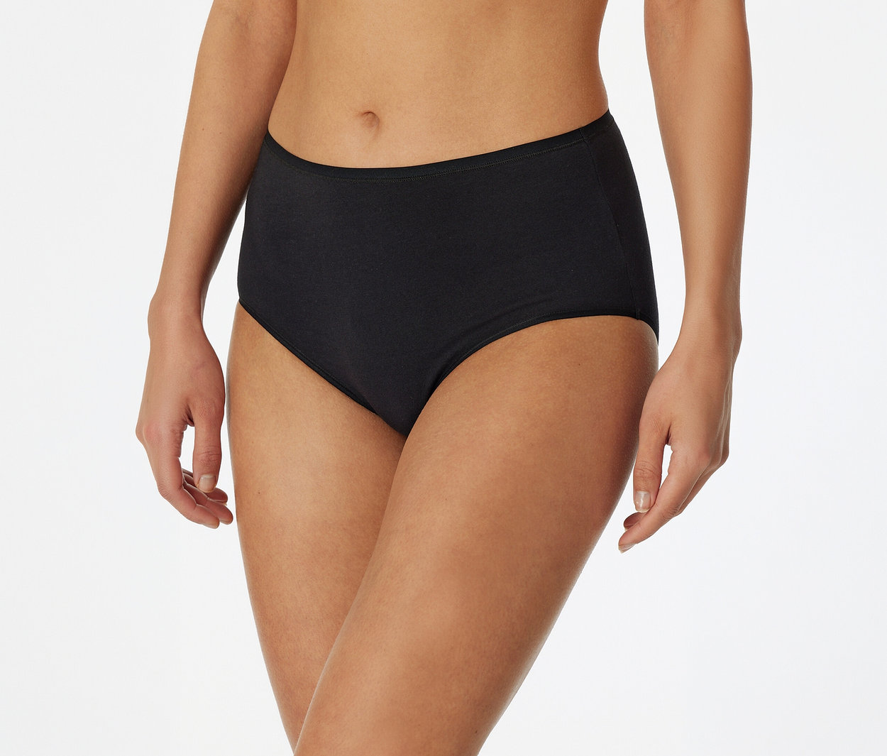Eine Person trägt einen schwarzen High-Waist-Slip.