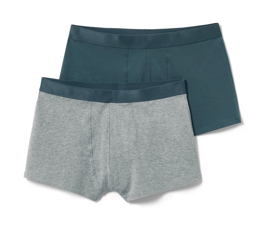 Zwei Slipboxer, eine grau und eine blaugrün.