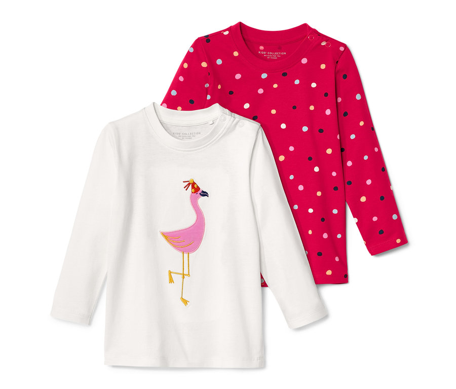 Zwei Kinder-Langarmshirts, eins mit Flamingo-Motiv, eins rot gepunktet.
