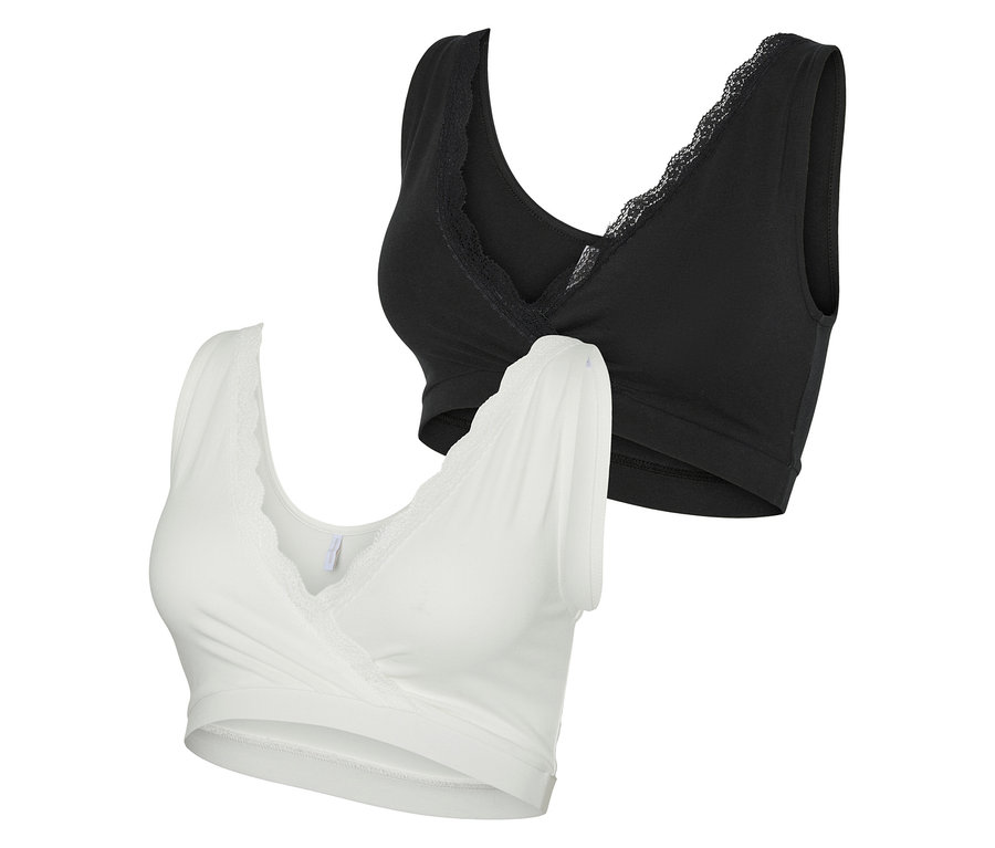 Zwei MAMALICIOUSMLHELENA CROSSY LACE BRA 2F 2-P NOOS, eines in Schwarz und eines in Weiß.