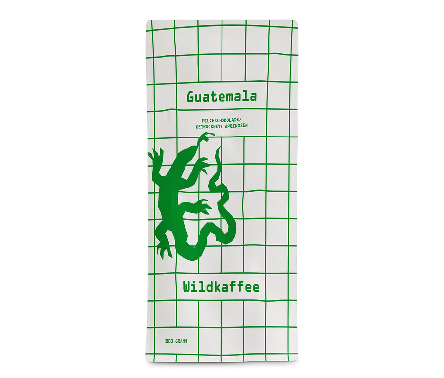 Packung Wildkaffee - Guatemala San Lorenzo Omni-Roast - 1 kg Ganze Bohne. Auf weißem Hintergrund ein grünes Gitter und eine grüne Abbildung eines Geckos.