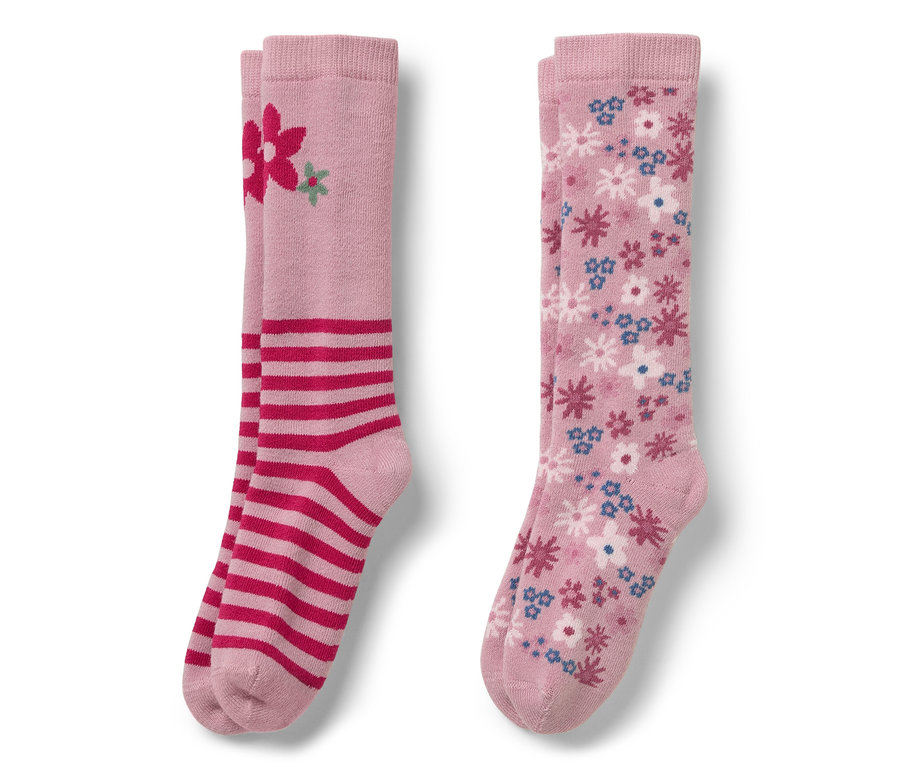 Zwei Paar rosa Kniestrümpfe. Ein Paar mit roten Streifen und Blume, das andere mit Blumenmuster.