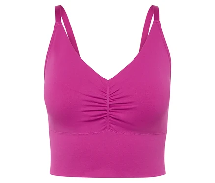 Detailansicht eines pinkfarbenen Sport-BHs mit dünnen Trägern.