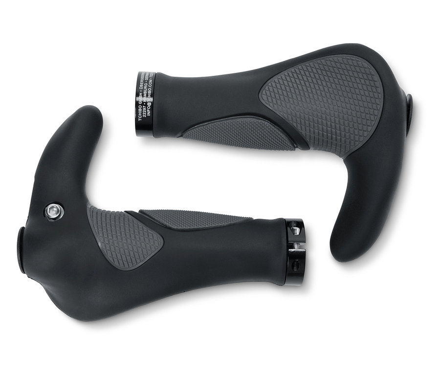 Zwei Fahrrad-Lenkergriffe liegen auf einem weißen Hintergrund.