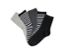 Fünf Paar Socken in Grau, Schwarz und Weiß.